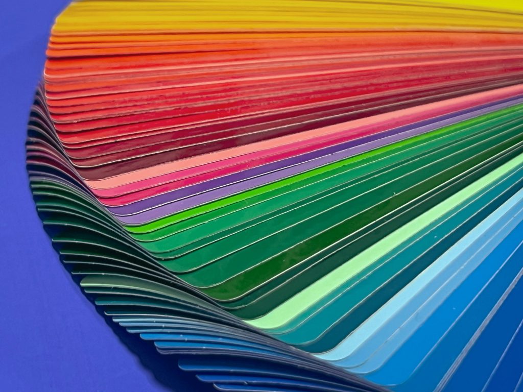 corob-paint-mixing-pexels-johndetochka-10275088 - McFaddens Blog colour fan deck for interior design project